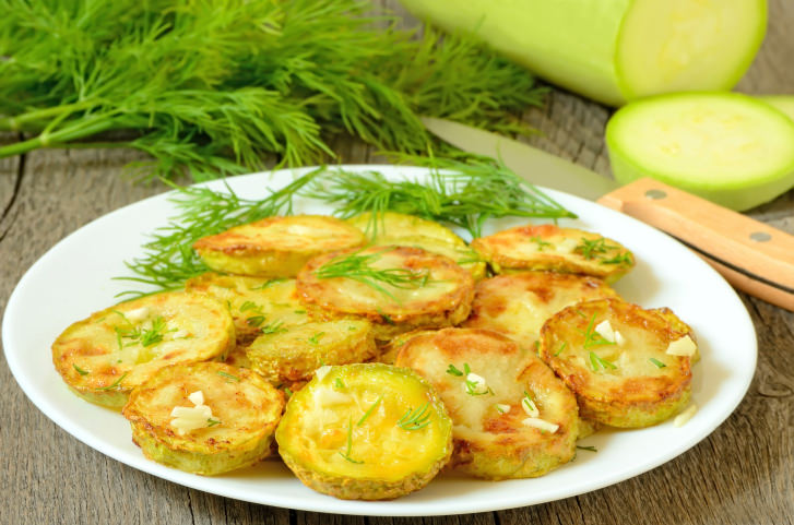 Fried zucchini with dill