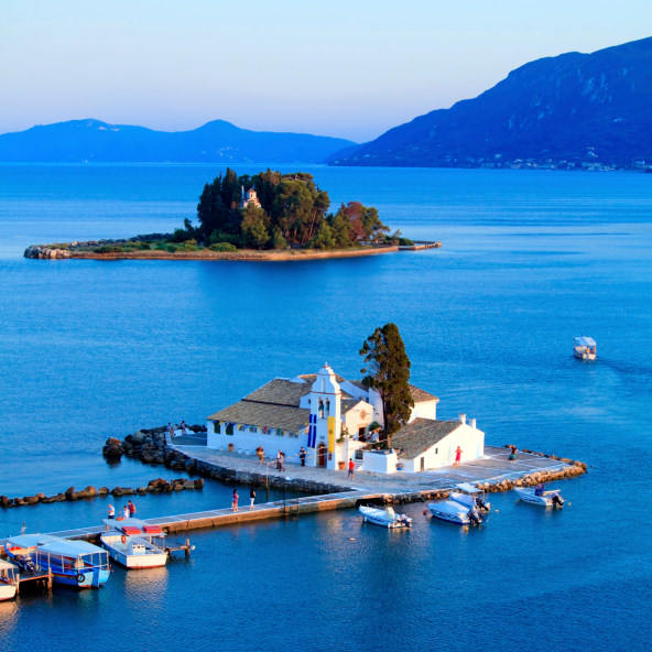 Sunset scene of Vlacherna monastery Kanoni Corfu Greece