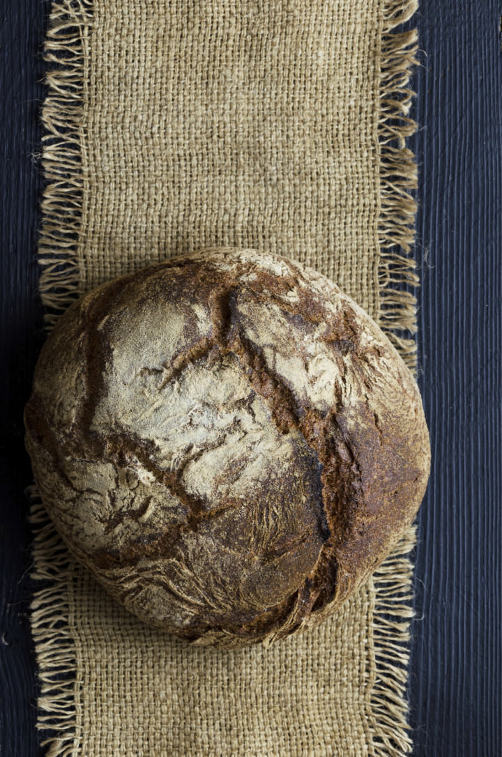 Traditional bread over burlap, above view