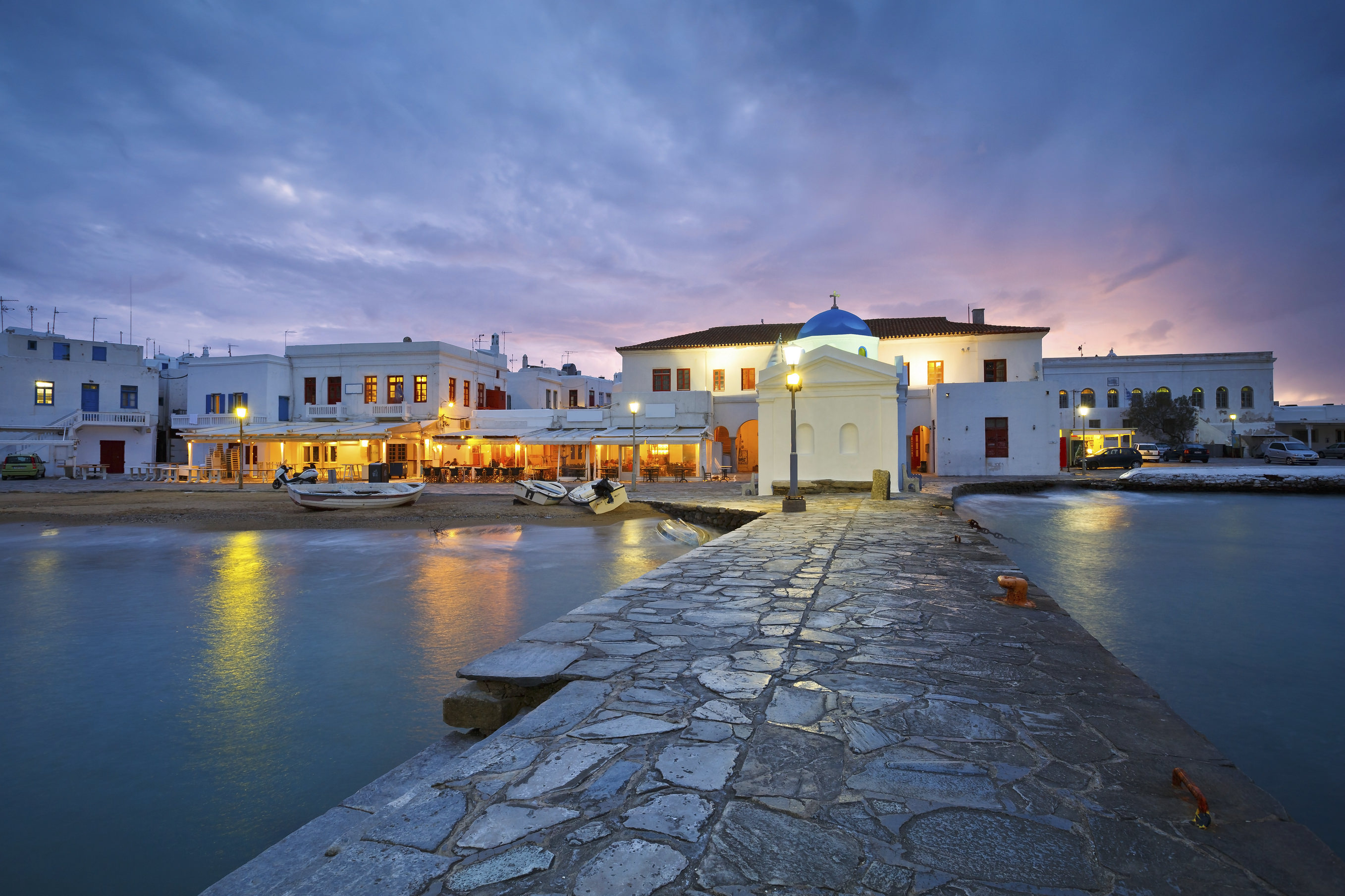 Town of Mykonos as seen from the old harbor. Image shows charateristi architecture of the old town.