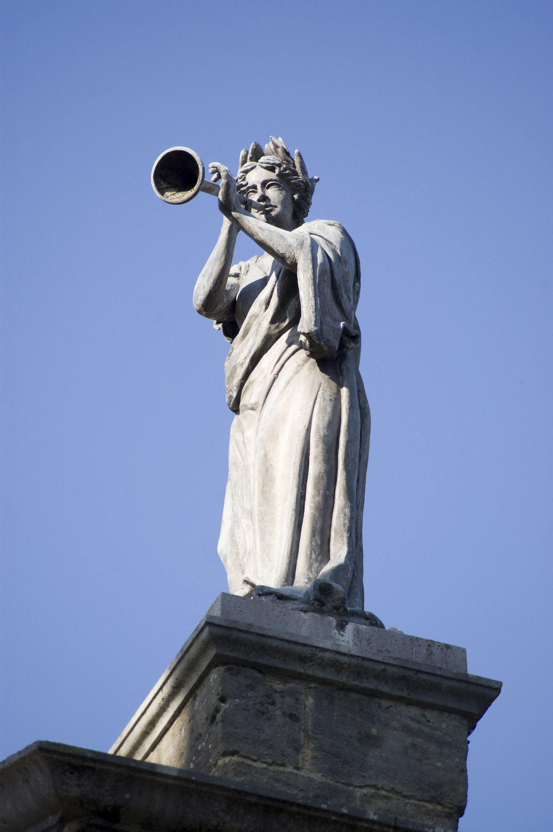 "Statue of the muse of music, Euterpe. Roof of the Clarendon building, Oxford University. The statue is by James Thornhill, dating from the early 18th century."