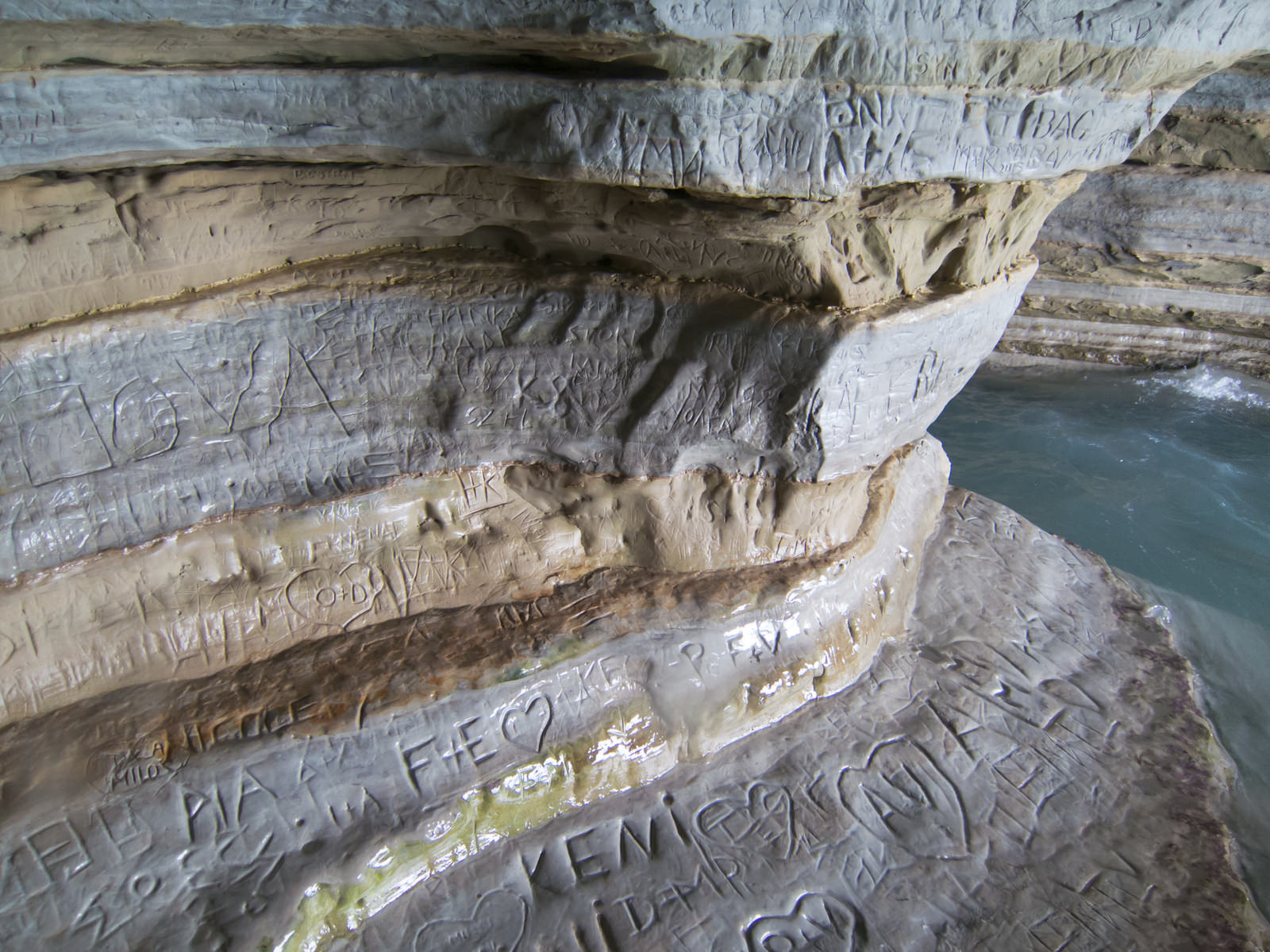 Cave where lovers carved they names on the stone wall